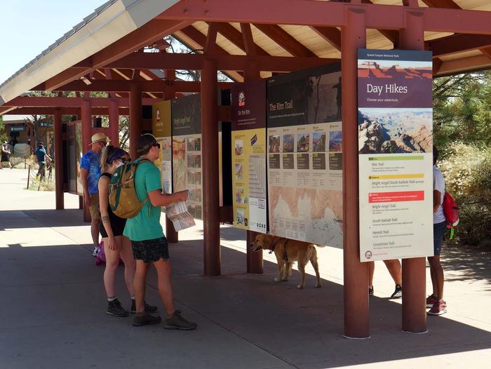 Information and trip planning exhibits in front of the Visitor Center.If you arrive when the building is closed, you will find trip planning, shuttle bus, and hiking information available on signs and exhibits outside of the building