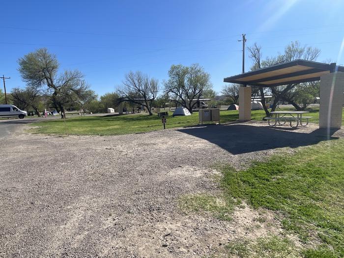 Site 50 driveway with shade structure, bear box, picnic table and grill