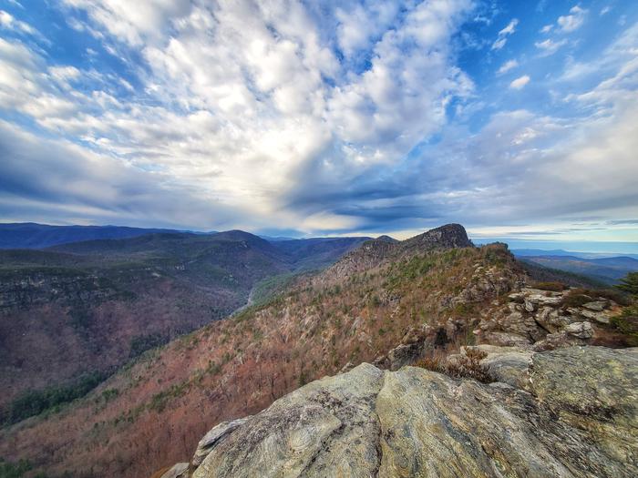 Mountain views with rocky foreground. View from a top Shortoff Mountain looking north through the Linville Gorge Wilderness. 