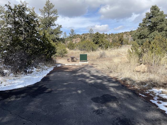 A photo of pull-in driveway at Site 54 of Loop Coyote  at JUNIPER CAMPGROUND