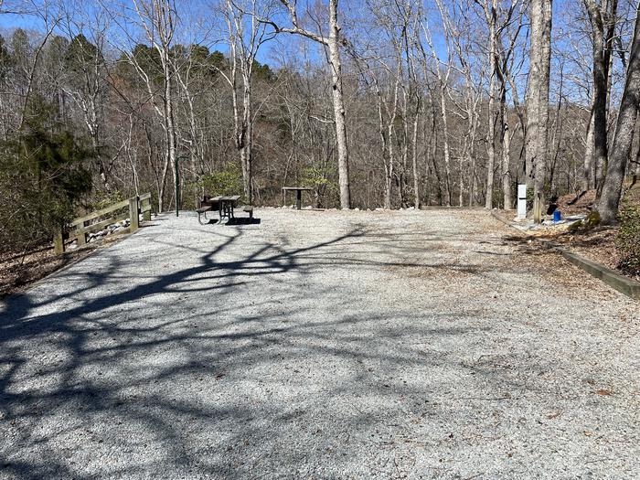 A photo of Site 55 of Loop RIGH at LONGWOOD PARK with Picnic Table, Electricity Hookup, Fire Pit, Tent Pad, Lantern Pole, Water Hookup