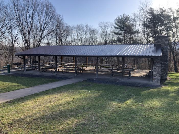 Picnic shelter with fireplace, tables, water fountain, and grillsIncluded Picnic