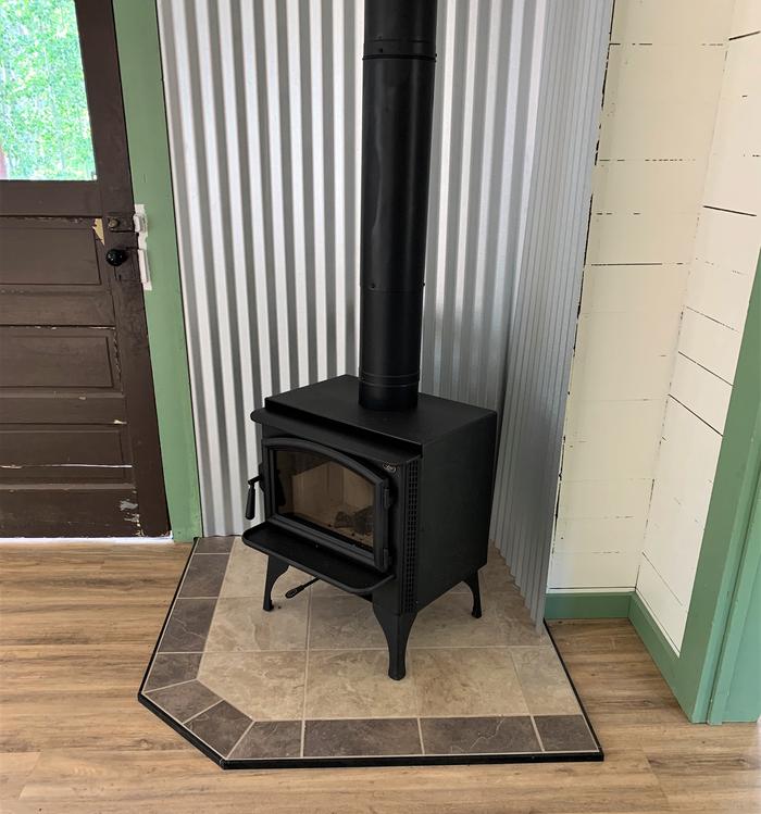 A new wood stove installed near the front door.Wood stove installed 2022 inside the guard station
