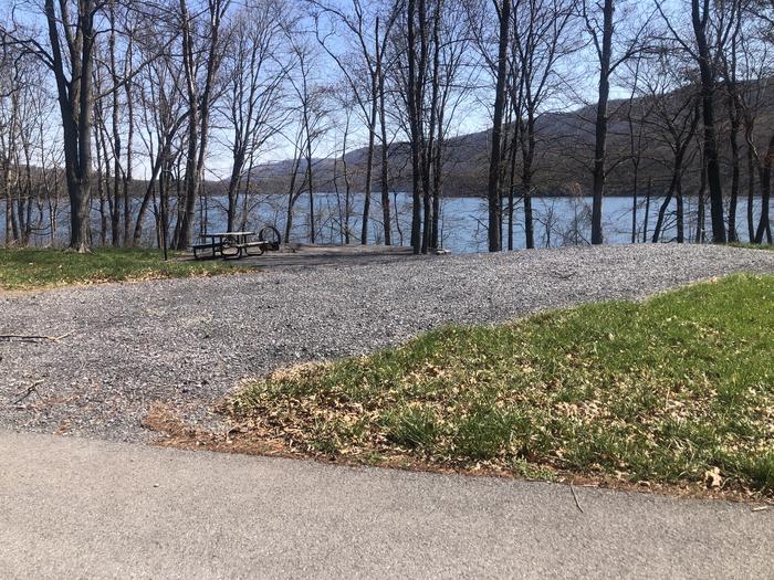A photo of Site 14 - near water of Loop SUSQUEHANNOCK  at SUSQUEHANNOCK with Picnic Table, Fire Pit, Tent Pad, Lantern Pole