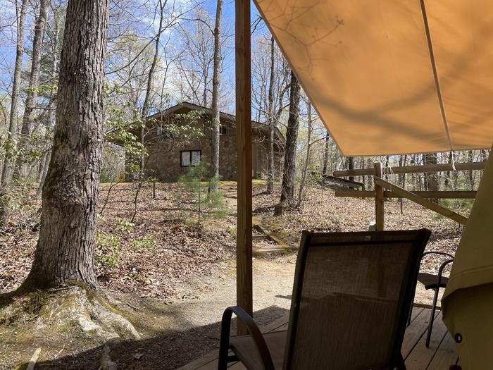 Glamping Tent #80 front deck (bathhouse in background)