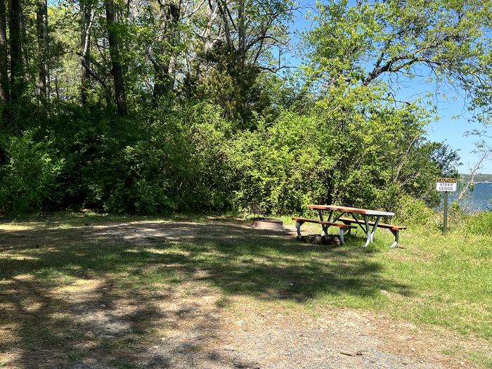 A photo of Site H1 of Loop Hog Point at Pax River Hog Point Campgrounds with Picnic Table, Waterfront and campfire ring
