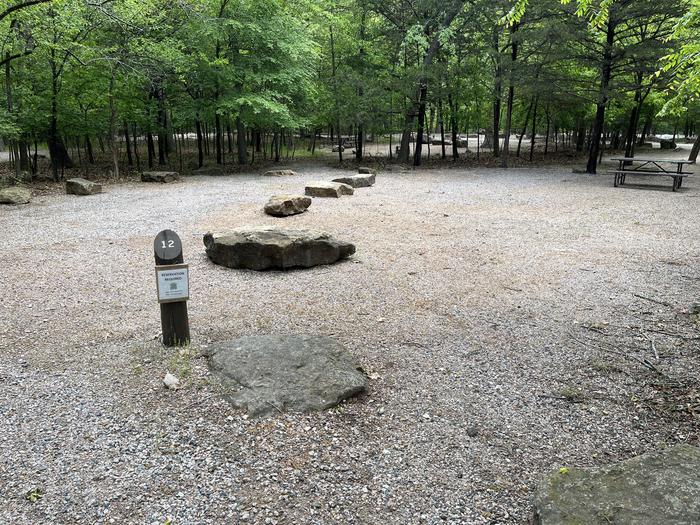 A photo of Site 12 of Loop Cold Springs at Cold Springs Campground (OK) Chickasaw NRA with Picnic Table, Fire Pit, Lantern Pole