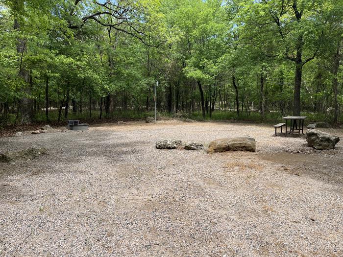 A photo of Site 10 of Loop Cold Springs at Cold Springs Campground (OK) Chickasaw NRA with Picnic Table, Fire Pit, Lantern Pole