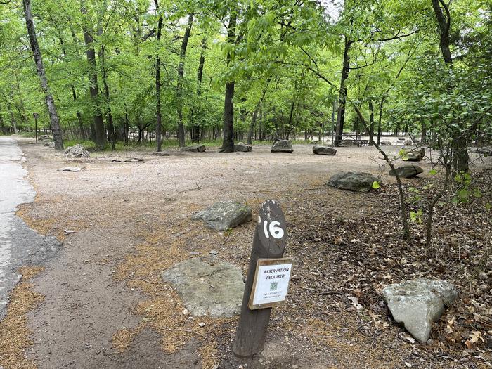 A photo of Site 16 of Loop Cold Springs at Cold Springs Campground (OK) Chickasaw NRA with Picnic Table, Fire Pit, Lantern Pole