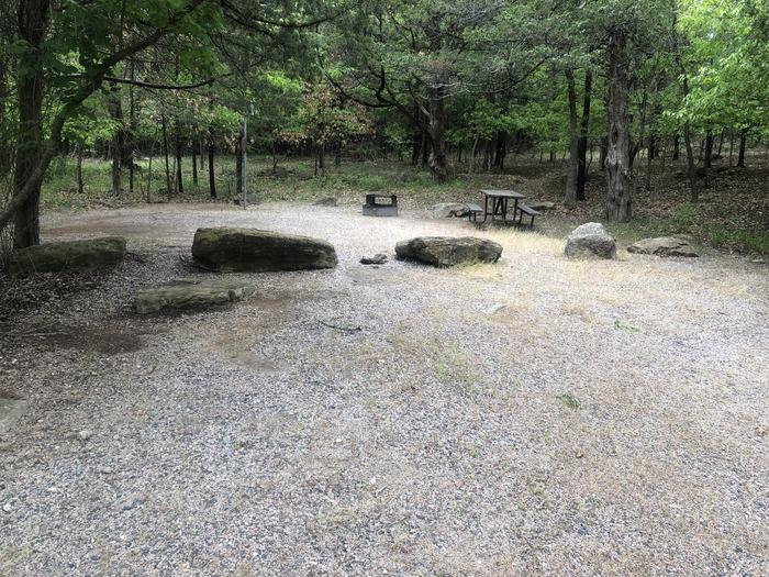A photo of Site 49 of Loop Cold Springs at Cold Springs Campground (OK) Chickasaw NRA with Picnic Table, Fire Pit, Lantern Pole