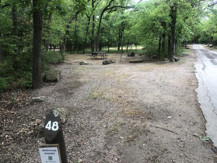 A photo of Site 48 of Loop Cold Springs at Cold Springs Campground (OK) Chickasaw NRA with Picnic Table, Fire Pit, Lantern Pole