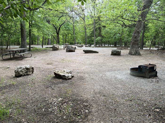 A photo of Site 31 at Cold Springs Campground (OK) Chickasaw NRA with Picnic Table, Fire Pit, Lantern Pole