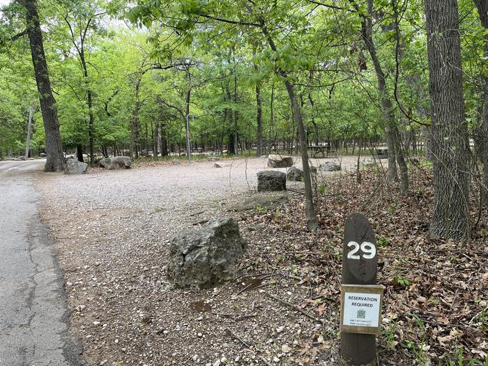 A photo of Site 29 at Cold Springs Campground (OK) Chickasaw NRA with Picnic Table, Fire Pit, Lantern Pole
