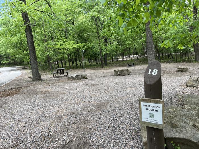 A photo of Site 18 of Loop Cold Springs at Cold Springs Campground (OK) Chickasaw NRA with Picnic Table, Fire Pit, Lantern Pole