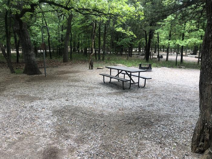 A photo of Site 53 of Loop Cold Springs at Cold Springs Campground (OK) Chickasaw NRA with Picnic Table, Fire Pit, Lantern Pole