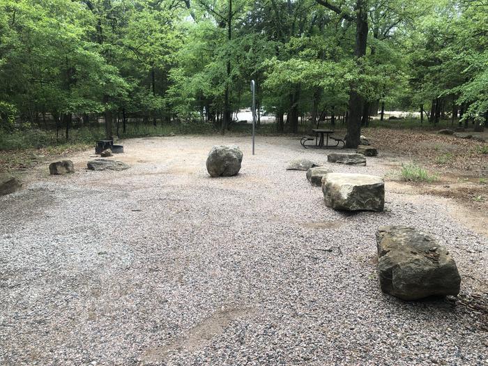 A photo of Site 59 of Loop Cold Springs at Cold Springs Campground (OK) Chickasaw NRA with Picnic Table, Fire Pit, Lantern Pole