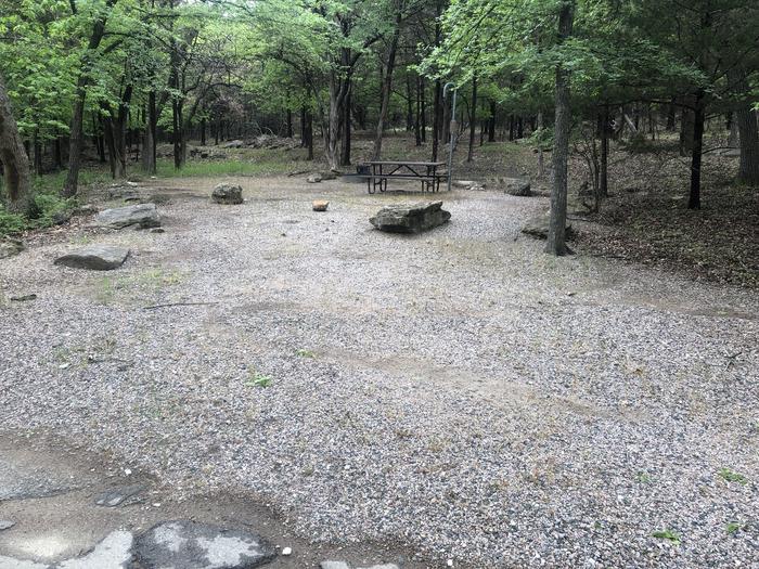 A photo of Site 47 of Loop Cold Springs at Cold Springs Campground (OK) Chickasaw NRA with Picnic Table, Fire Pit, Lantern Pole
