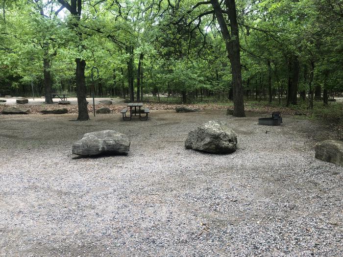 A photo of Site 61 of Loop Cold Springs at Cold Springs Campground (OK) Chickasaw NRA with Picnic Table, Fire Pit, Lantern Pole
