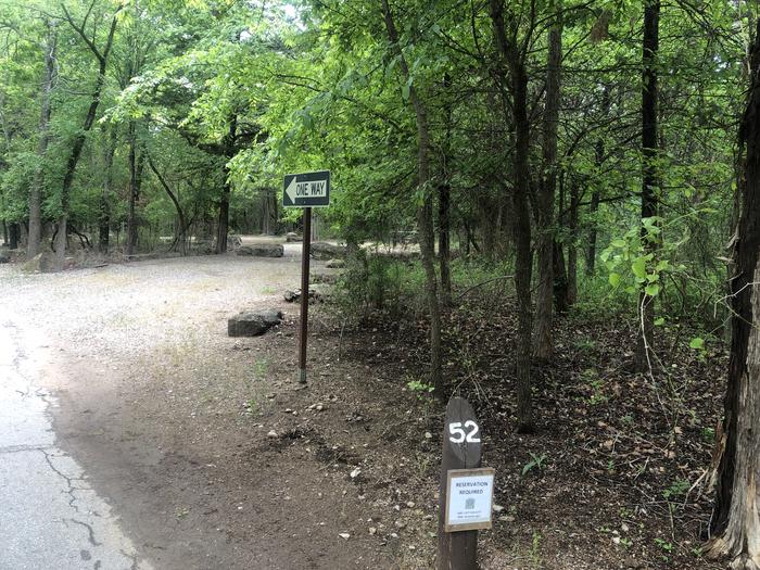 A photo of Site 52 of Loop Cold Springs at Cold Springs Campground (OK) Chickasaw NRA with Picnic Table, Fire Pit, Lantern Pole