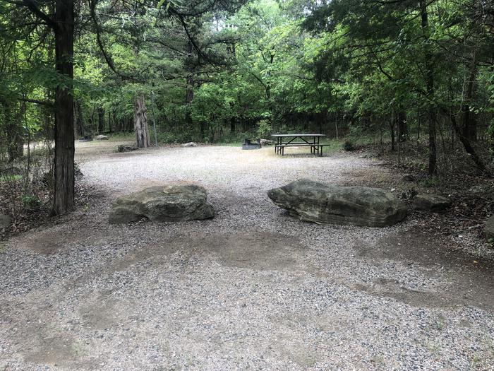 A photo of Site 52 of Loop Cold Springs at Cold Springs Campground (OK) Chickasaw NRA with Picnic Table, Fire Pit, Lantern Pole