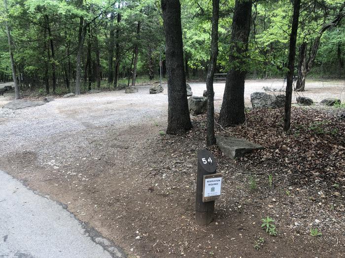 A photo of Site 54 of Loop Cold Springs at Cold Springs Campground (OK) Chickasaw NRA with Picnic Table, Fire Pit, Lantern Pole
