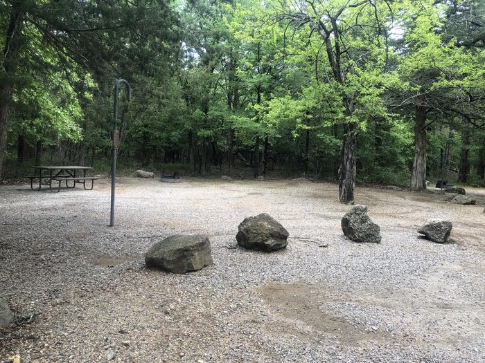 A photo of Site 54 of Loop Cold Springs at Cold Springs Campground (OK) Chickasaw NRA with Picnic Table, Fire Pit, Lantern Pole
