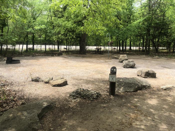 A photo of Site 44 of Loop Cold Springs at Cold Springs Campground (OK) Chickasaw NRA with Picnic Table, Fire Pit, Lantern Pole