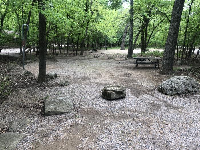 A photo of Site 45 of Loop Cold Springs at Cold Springs Campground (OK) Chickasaw NRA with Picnic Table, Fire Pit, Lantern Pole