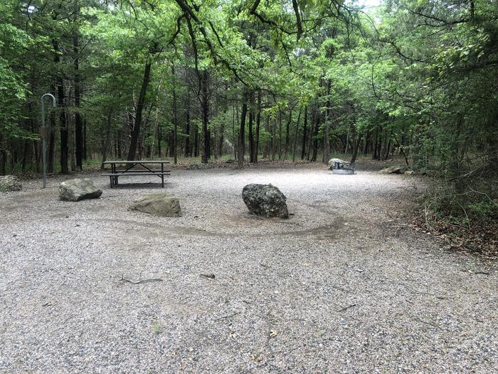A photo of Site 62 of Loop Cold Springs at Cold Springs Campground (OK) Chickasaw NRA with Picnic Table, Fire Pit, Lantern Pole
