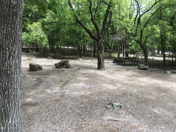 A photo of Site 43 of Loop Cold Springs at Cold Springs Campground (OK) Chickasaw NRA with Picnic Table, Fire Pit, Lantern Pole