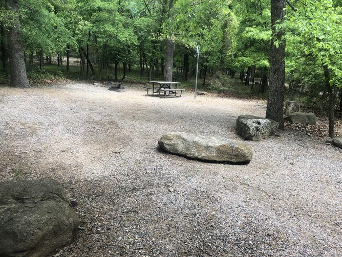 A photo of Site 13 of Loop Cold Springs at Cold Springs Campground (OK) Chickasaw NRA with Picnic Table, Fire Pit, Lantern Pole