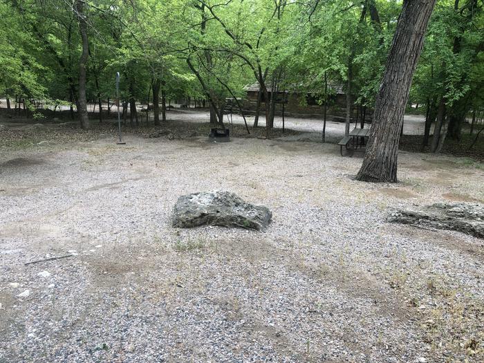 A photo of Site 46 of Loop Cold Springs at Cold Springs Campground (OK) Chickasaw NRA with Picnic Table, Fire Pit, Lantern Pole