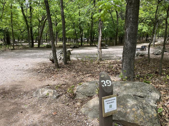 A photo of Site 39 at Cold Springs Campground (OK) Chickasaw NRA with Picnic Table, Fire Pit, Lantern Pole