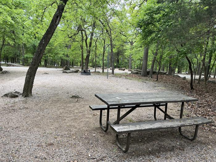 A photo of Site 32 at Cold Springs Campground (OK) Chickasaw NRA with Picnic Table, Fire Pit, Lantern Pole
