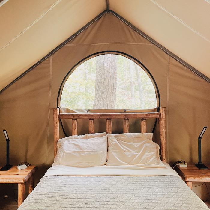 Lake Powhatan Glamping TentGlamping is all about finding the perfect relationship between nature and comfort. These Glamping tents provide all you’ll need, plus some. 