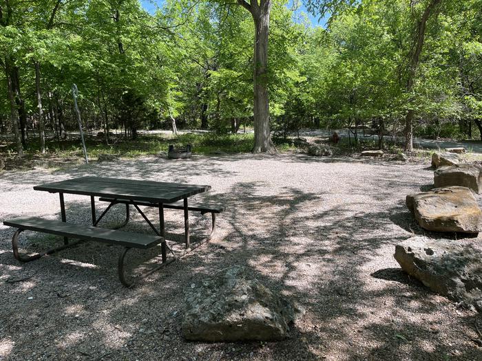 A photo of Site 19 at Cold Springs Campground (OK) Chickasaw NRA with Picnic Table, Fire Pit, Lantern Pole