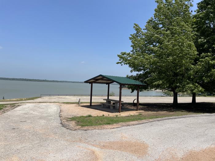 A photo of Site 040 of Loop LIBERTY HILL at LIBERTY HILL (Navarro Mills Lake) with Picnic Table, Electricity Hookup, Water Hookup