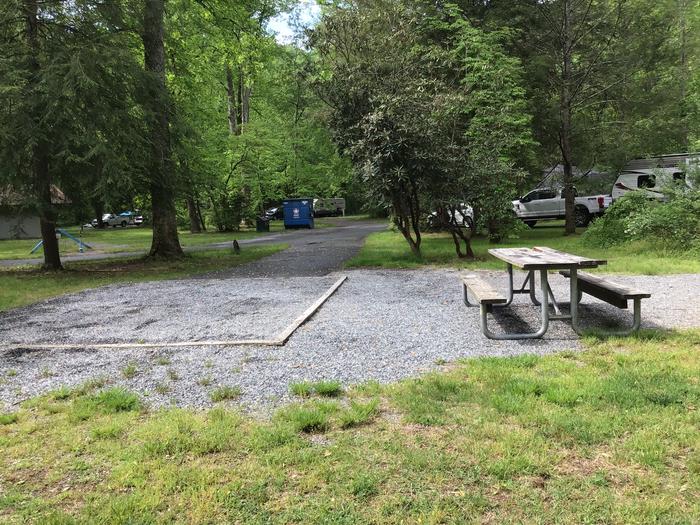 Davidson River Campground - Sycamore Loop, Site 009. Directly across from bathhouse. Water spigot located in front of bathhouse. 