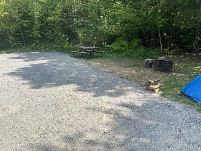 A photo of Site 16 of Loop  at Grout Pond Campground with Picnic Table, Fire Pit, Shade
