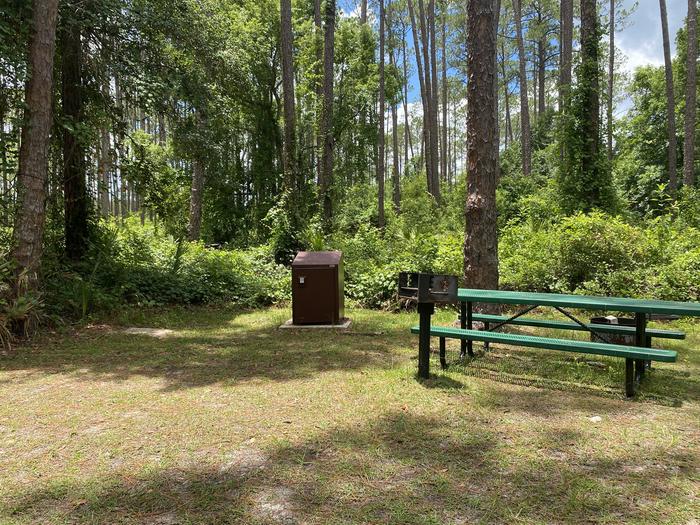 A photo of Site 13 of Loop Lake Dorr at Lake Dorr Campground with Picnic Table, Fire Pit, Shade, Food Storage