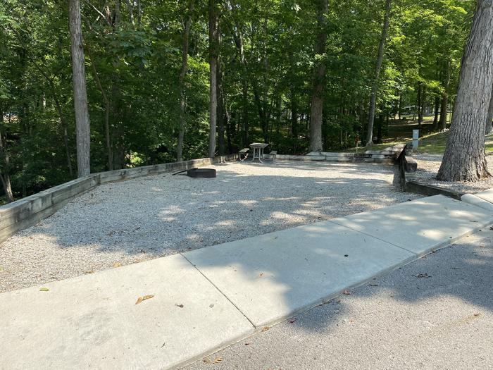 A photo of Site 09 of Loop CPOI at CUMBERLAND POINT CAMPGROUND with Boat Ramp, Picnic Table, Electricity Hookup, Fire Pit, Shade, Water Hookup