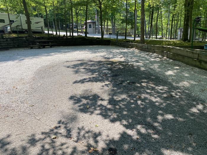 A photo of Site 24 of Loop CPOI at CUMBERLAND POINT CAMPGROUND with Boat Ramp, Picnic Table, Electricity Hookup, Fire Pit, Shade, Lantern Pole, Water Hookup