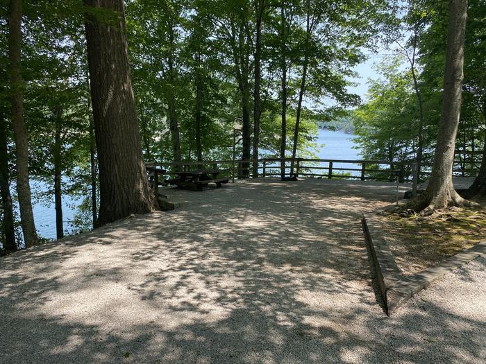 A photo of Site 29 of Loop CPOI at CUMBERLAND POINT CAMPGROUND with Boat Ramp, Picnic Table, Electricity Hookup, Fire Pit, Shade, Waterfront, Lantern Pole, Water Hookup