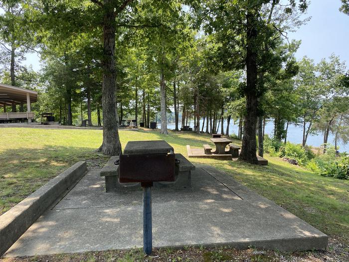A photo of facility CUMBERLAND POINT CAMPGROUND with Picnic Table, grill for day use picnics. 