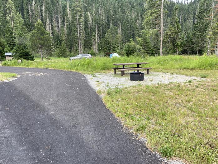 A photo of Site C044 of Loop C at KIT PRICE with Picnic Table, Fire Pit. Pull through site.