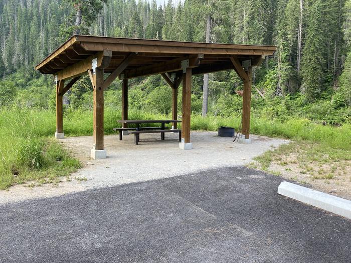 A photo of Site C049 of Loop C at KIT PRICE with Picnic Table, Fire Pit, Shade