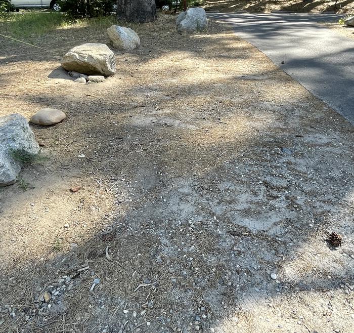 Parking Pad Site 14 Not LevelParking Pad. Large rock to mark boundaries. Not level