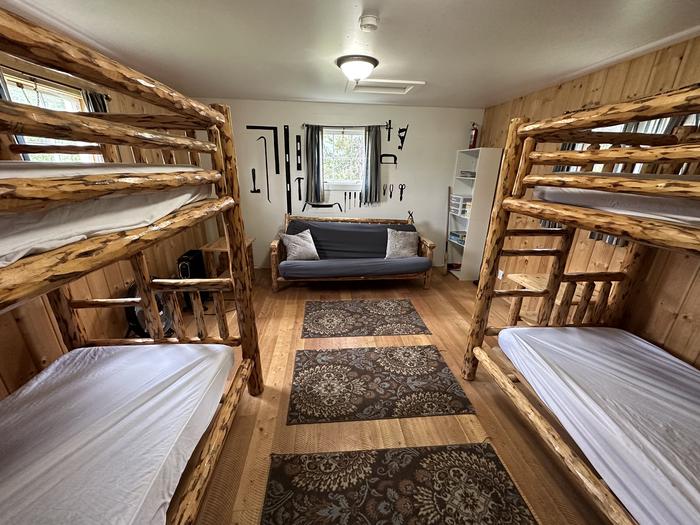 historic forest service tool shed converted into a bunkhouse.Star Meadow Guard Station bunkhouse with two bunkbeds and a futon couch. Sleeps 6, great for the kids!