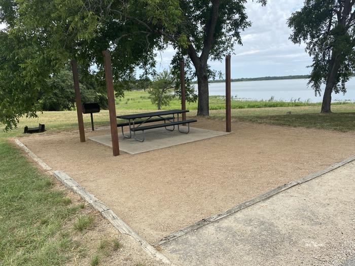 
 picnic table, grill, and fire ring with great view of Waco Lake
