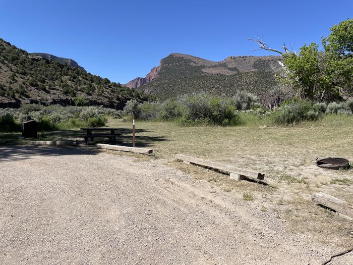 A photo of Site 11 of Loop  at Gates of Lodore Campground with Picnic Table, Fire Pit, Food Storage